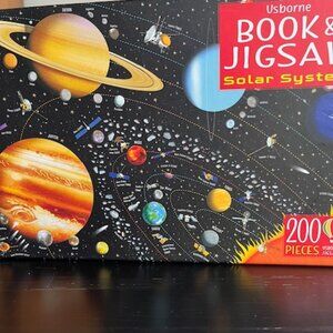 Usborne Book and jig saw puzzle Solar system.